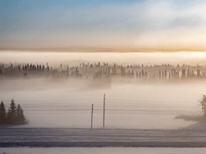 A layer of ice fog lying low in the Tanana Valley as the sun sets.